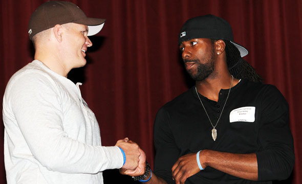 Dallas Cowboys players, Rapper pays visit to sophomore class for motivational speeches