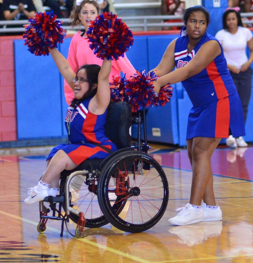 Senior Sparklers Cheer captain Genesis Montanez pumps up the crowd as she chants DHS the Best at a recent pep rally in Sandra Meadows Arena.  The tem is one of five in the state. (Ciara Thibodaux photo)