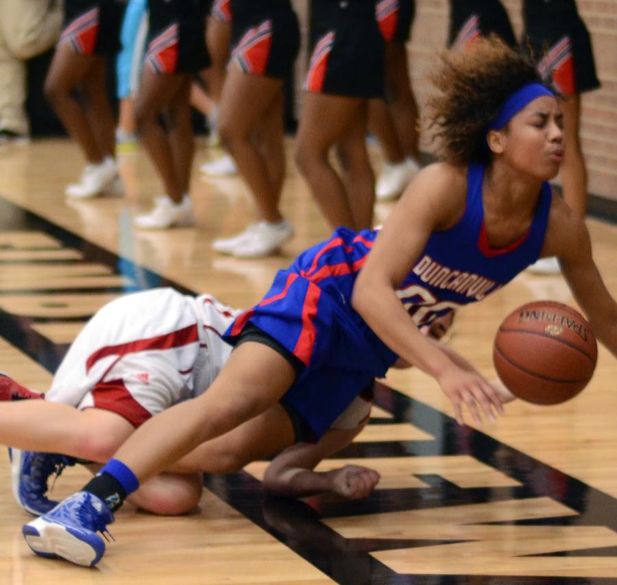 Senior Kiera Perry fights for the ball against Cedar Hill in the Reginal Quarterfinals 65-29 win. (Cody Rogers photo)
