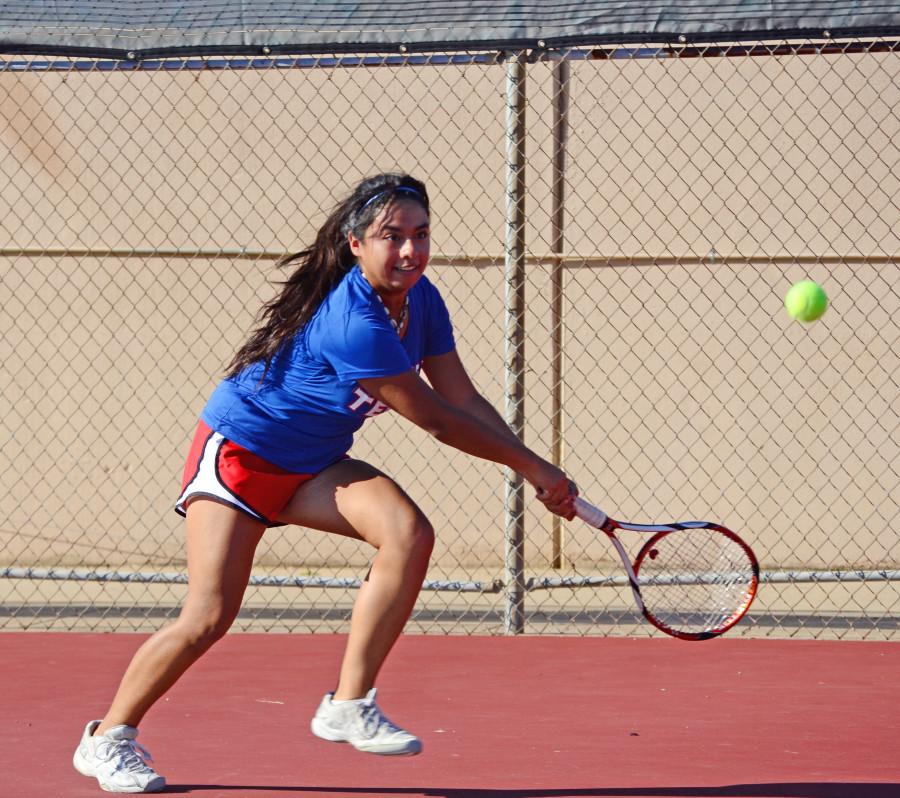 Senior Rebecca Vega goes for the ball in a match against Cedar Hill. (Karla Estrada photo)