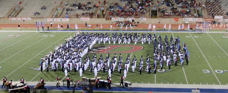 Video: Band performs at last football game in Mansfield