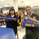 Vanessa Sanchez(left) and Ivana Gossett take the time to show off their winning banners for the recent contest. (submitted photo)
