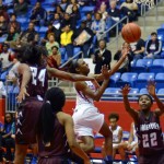 Senior guard Tasia Foman presses the lane for the shot against Timberview. The Pantherettes had their first test of the season against Timberview but came out on top to remain undefeated. (Olivia Davila photo)