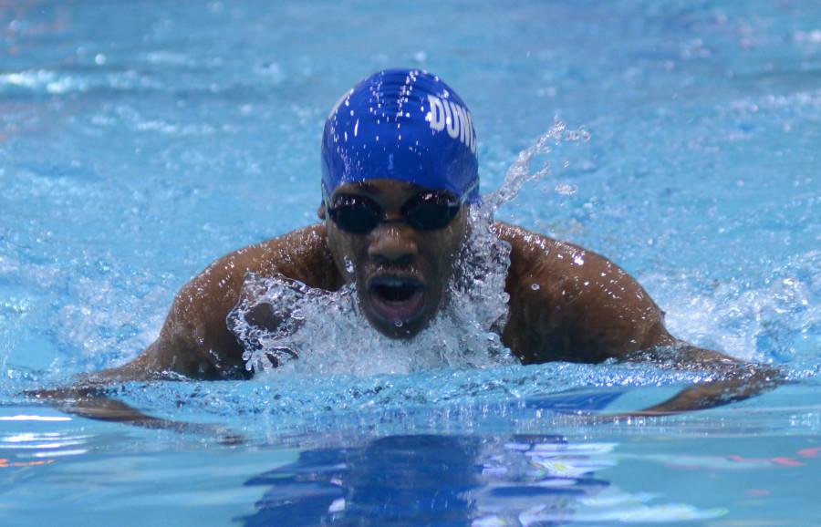 Junior+Carlus+Brown+nears+the+finish+line+in+his+race+at+the+District+7-5A+swim+meet.+The+boys+finished+in+4rth+place+and+sent+several+swimmers+to+the+Regional+meet.+%28Yonas+Nielsen+photo%29