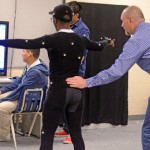 Animation teacher Peter Landrey assist his students with the new process of Motion Capture. The process is used in many animated movies and games and advanced animation students have the opportunity to experiment wit the process for one of their projects. (Josephine Xarrayaj photo)