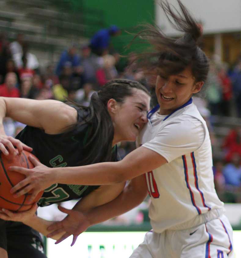 Junior Nina Alvarez forces the steal from a Southlake Dragon player in the Pantherettes recent playoff win. (Karla Estrada photo)