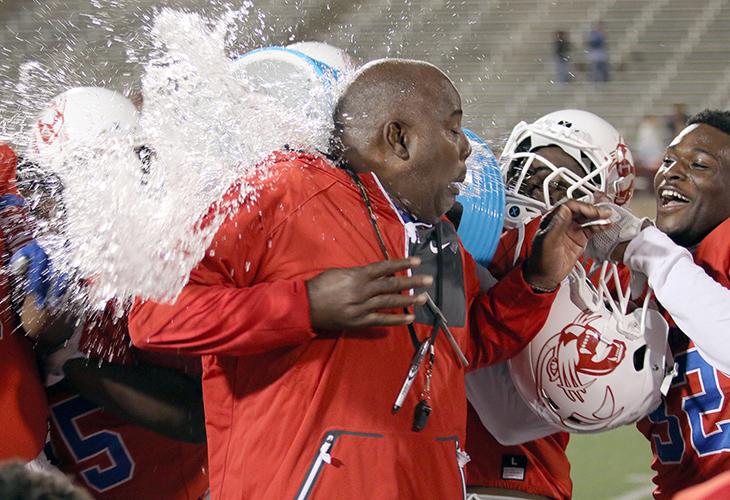 Panther Head Coach Reginald Samples takes a shower at the hands of this team after Duncanvilles first round playoff win. (Jose Sanchez photo)
