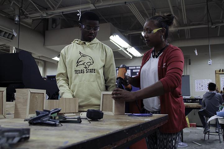 Duncanville Students build floats for the Christmas parade