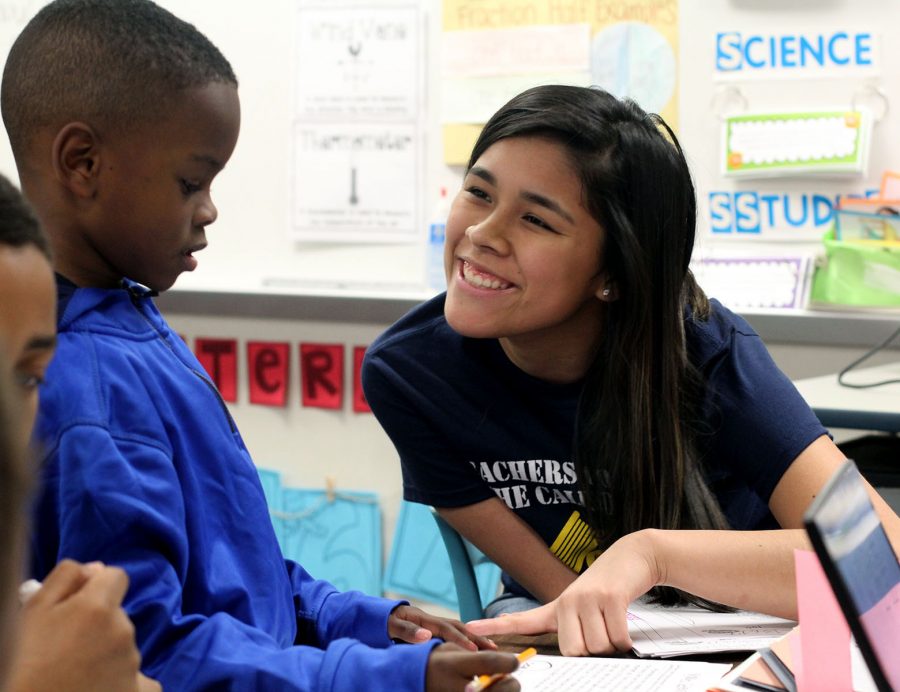 Students become teachers for youngsters during visits to elementary schools. (Joel Lopez photo)