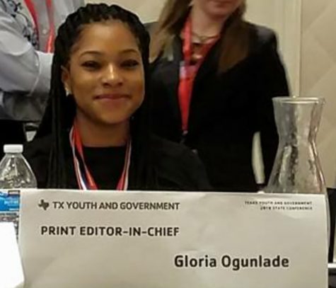 Gloria Ogunlade takes her seat at the table as newly elected Youth and Government Editor-In- Chief. (Dianne Williams photo)