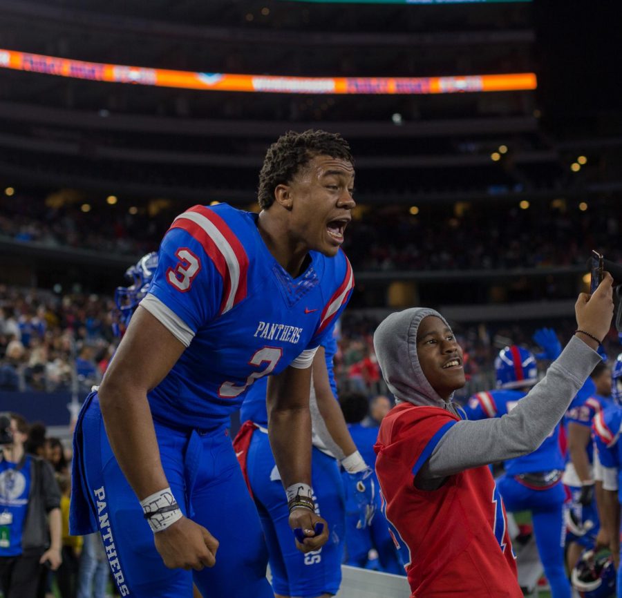 Jaquenden Jackson celebrates  on the sideline at AT&T Stadium after Duncanville takes the lead in the fourth quarter vs Allen in the UIL state semifinals vs Allen.