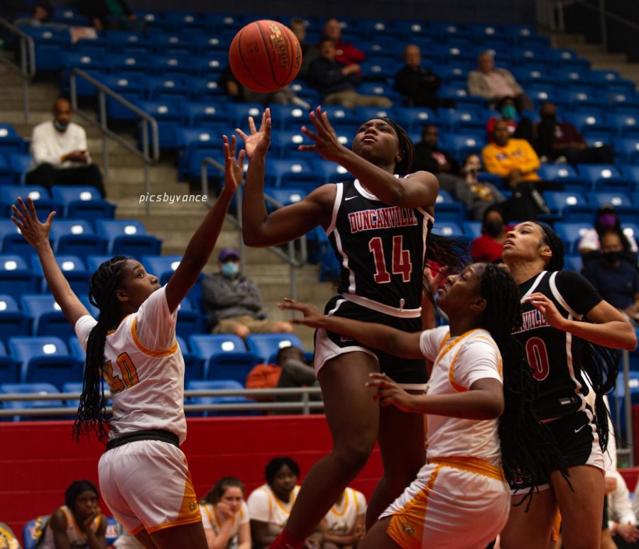 Breniya Arnold goes up against Walker LA during the Sandra Meadows Classic.