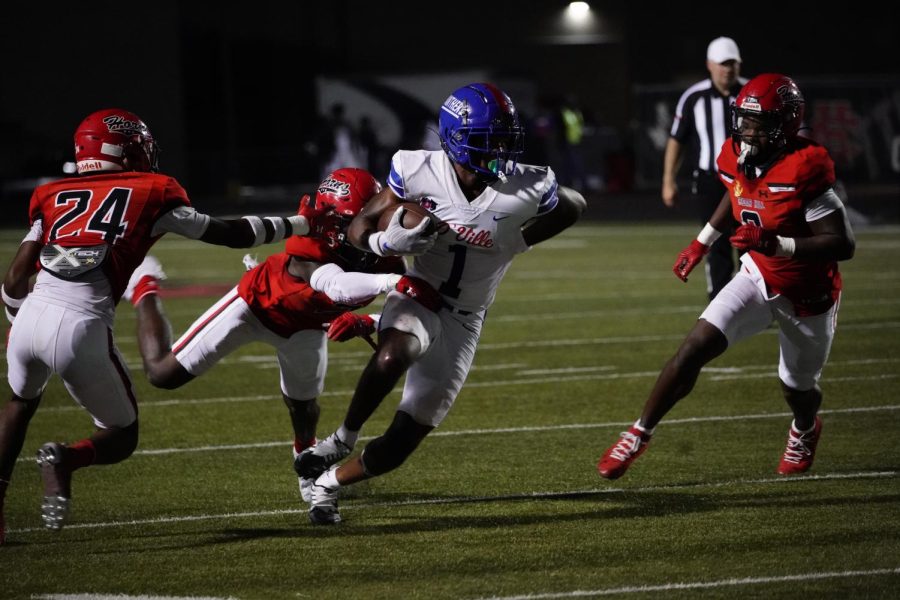 (1) Lontrell Turner escapes after the catch against Cedar Hill.  